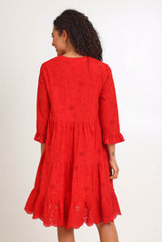 Model Pamelar wearing size 10 of the Essentials Broderie Frill Hem and Sleeves Dress - Red in colour Red, from the back