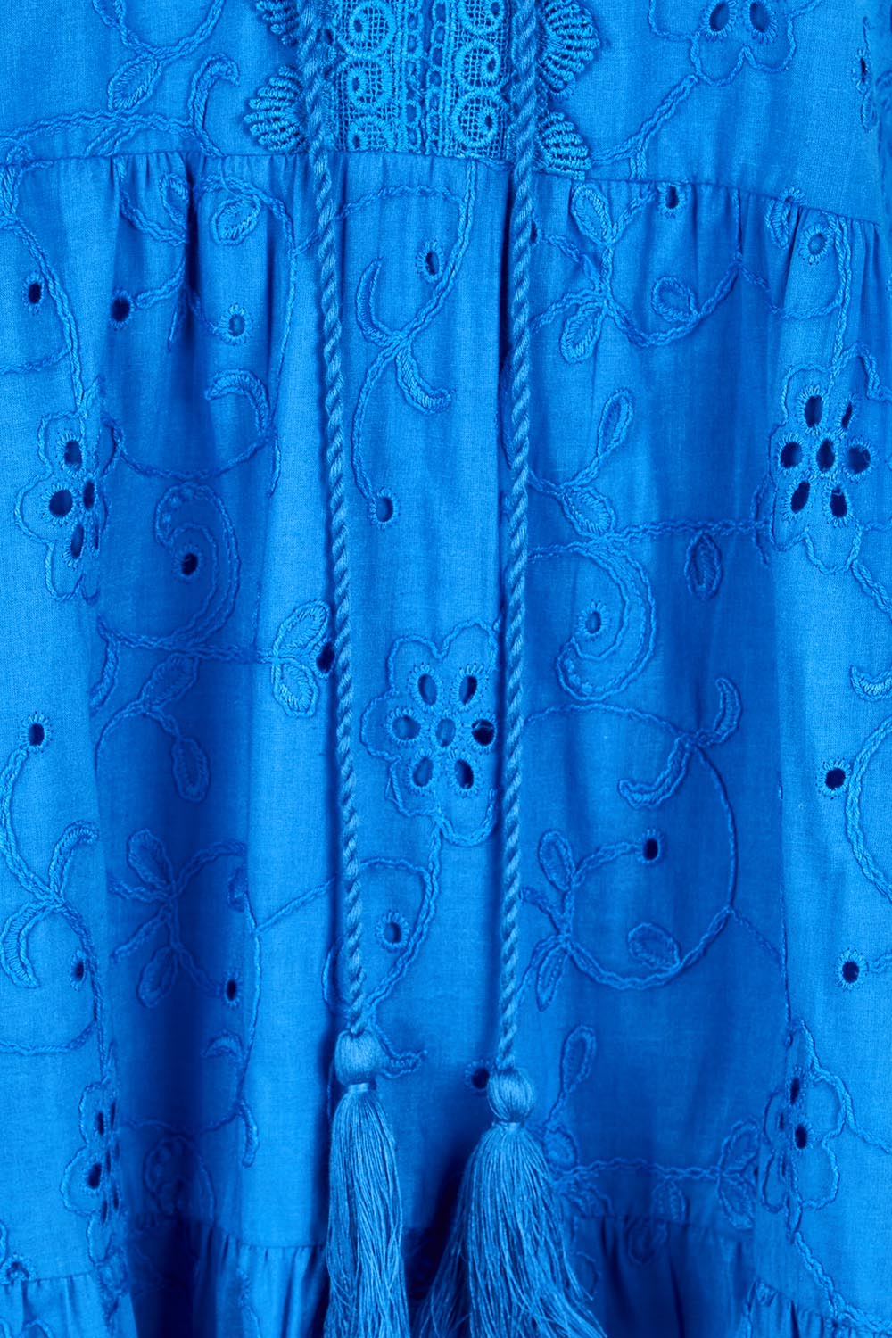 Product shot of the Essentials Broderie Layers Dress - Blue in colour Blue, showing detail