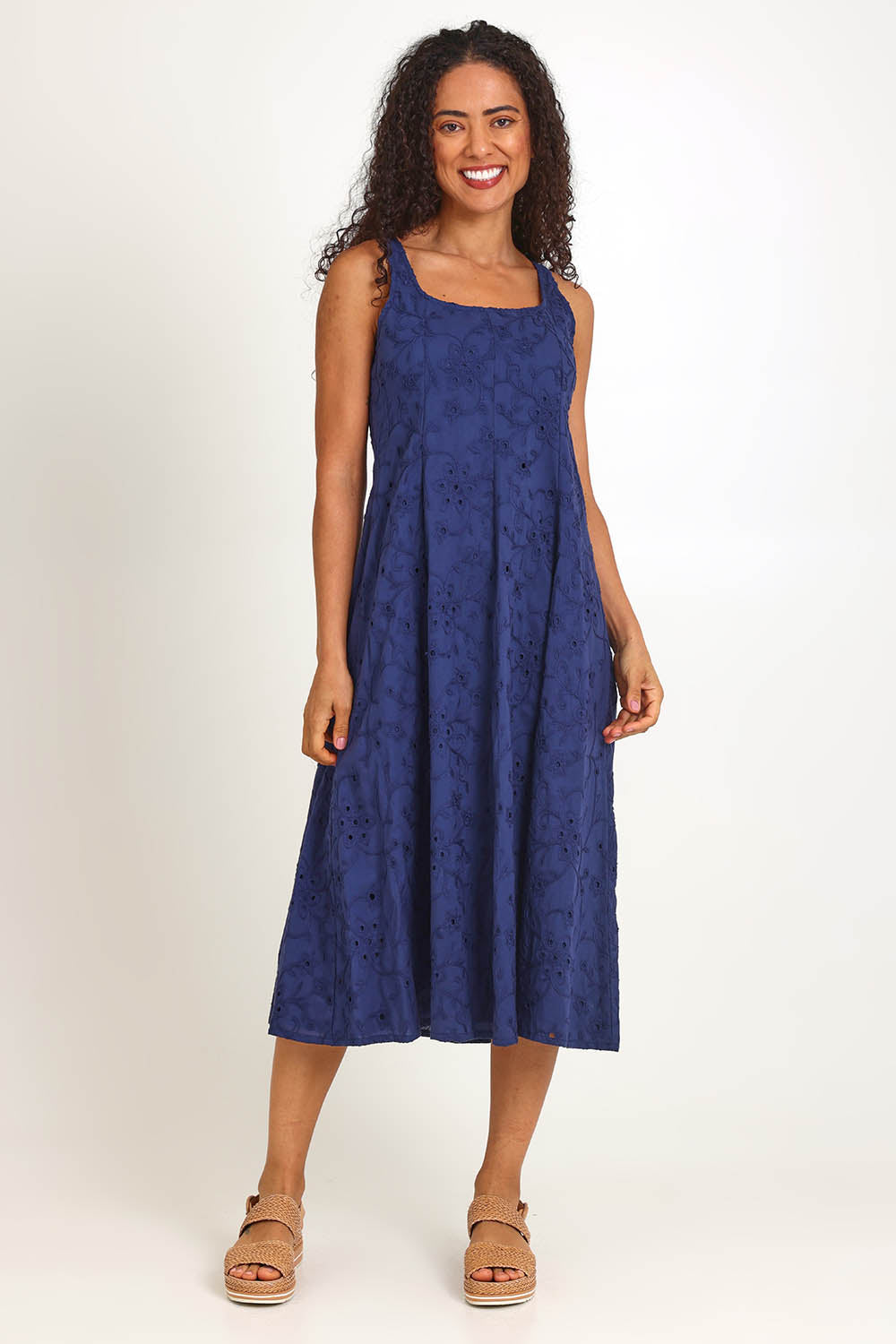 Model Pamelar wearing size 10 of the Essentials Broderie Strappy Cotton Dress - Navy in colour Navy, from the front