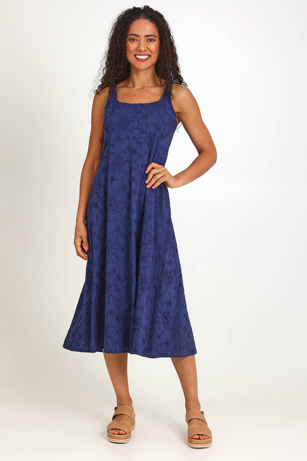 Model Pamelar wearing size 10 of the Essentials Broderie Strappy Cotton Dress - Navy in colour Navy, from the front
