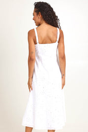 Model Pamelar wearing size 10 of the Essentials Broderie Strappy Cotton Dress - White in colour White, from the back