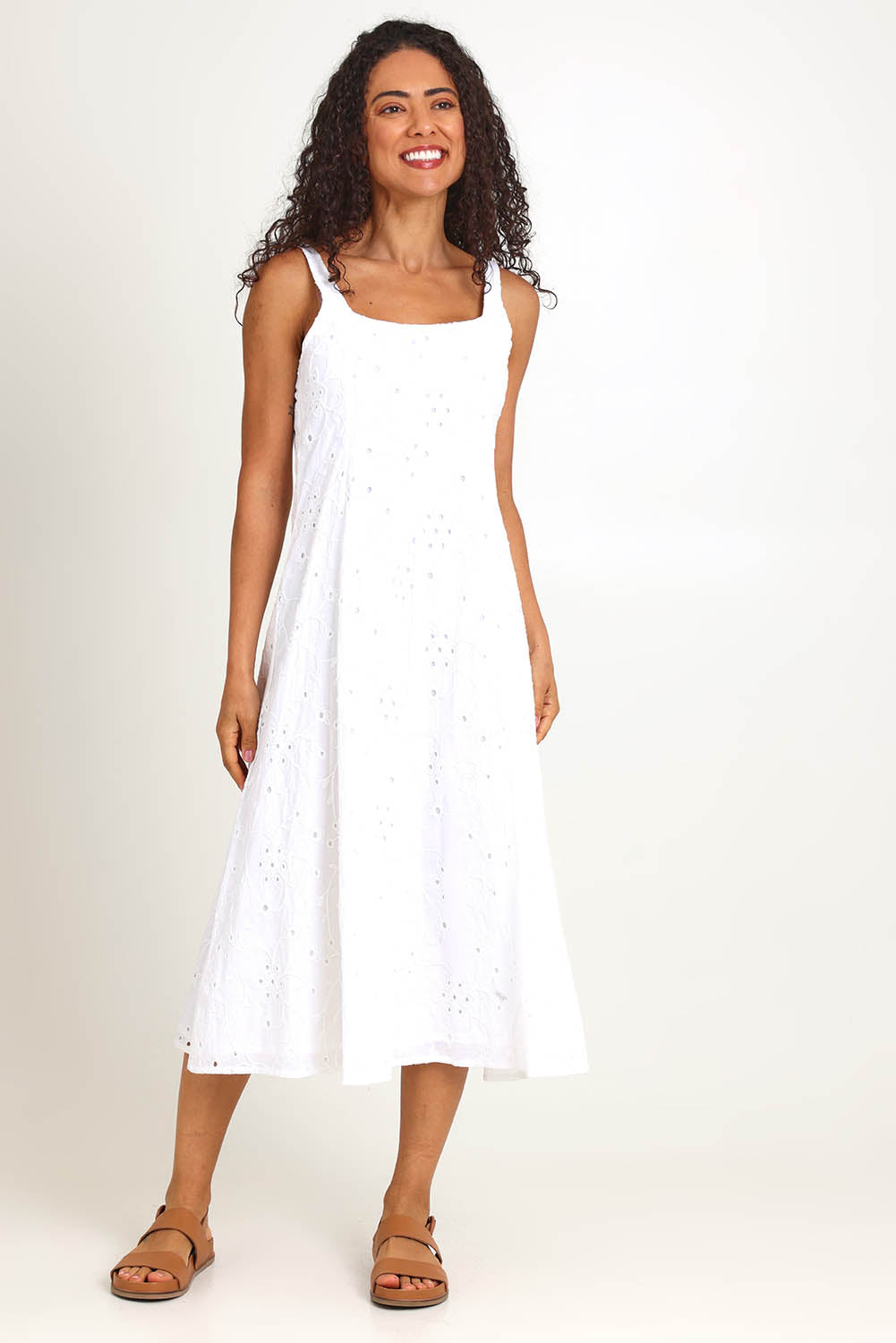 Model Pamelar wearing size 10 of the Essentials Broderie Strappy Cotton Dress - White in colour White, from the front