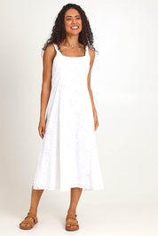 Model Pamelar wearing size 10 of the Essentials Broderie Strappy Cotton Dress - White in colour White, from the front