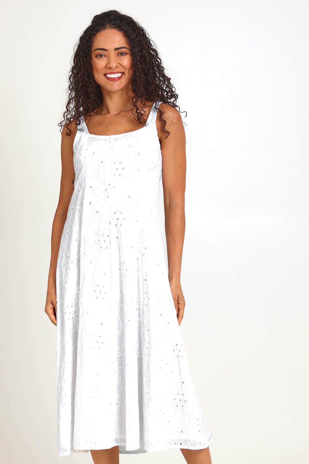 Model Pamelar wearing size 10 of the Essentials Broderie Strappy Cotton Dress - White in colour White, from the front
