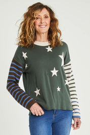 Model Emma wearing size 10 of the Knit Reversible Organic Cotton Jumper in colour Colour1 (Green), from the front, cropped image