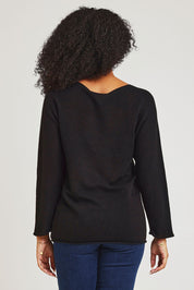 Model Ziara wearing size 10 of the Essentials Organic Cotton Boat Ls Neck Top in colour Black (Black), from the back