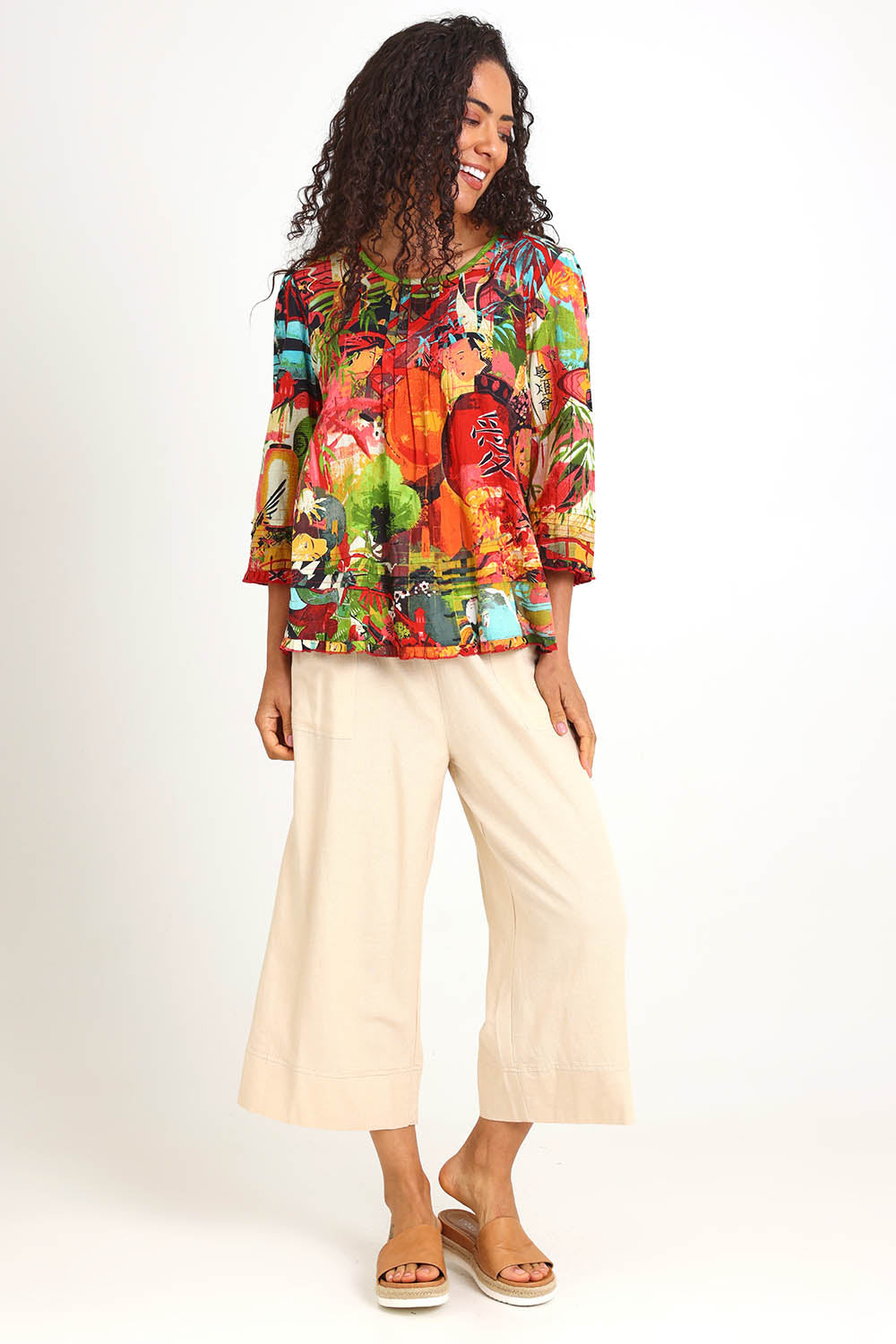 Model Pamelar wearing size 10 of the Pleated Top – Print in colour Print, from the front