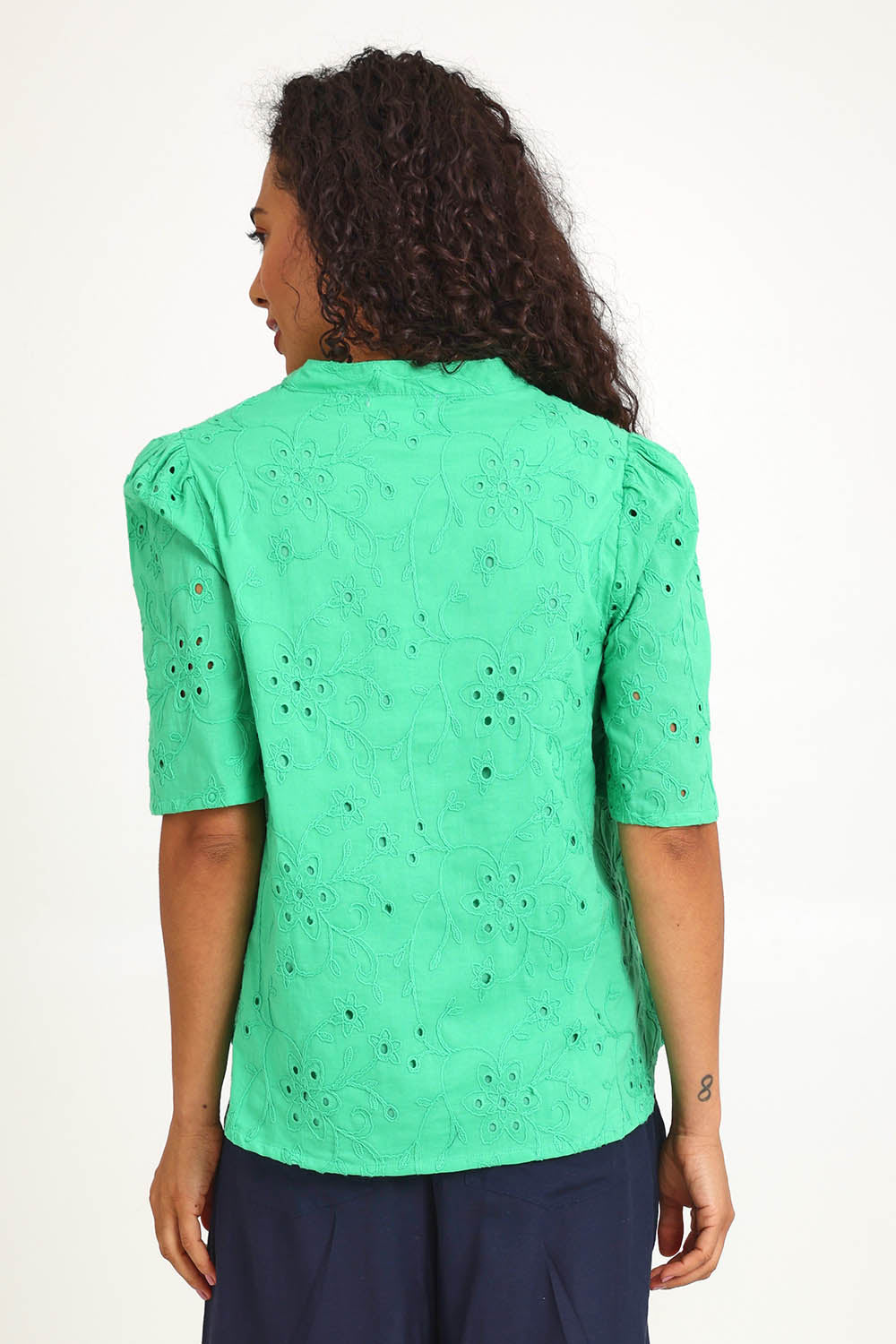 Model Pamelar wearing size 10 of the Essentials Broderie Cotton Top - Green in colour Green, from the back