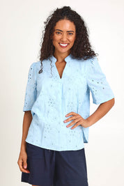 Model Pamelar wearing size 10 of the Essentials Broderie Cotton Top - Sky in colour Sky, in a cropped view