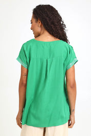 Model Pamelar wearing size 10 of the Embellished Tee – Green in colour Green, from the back