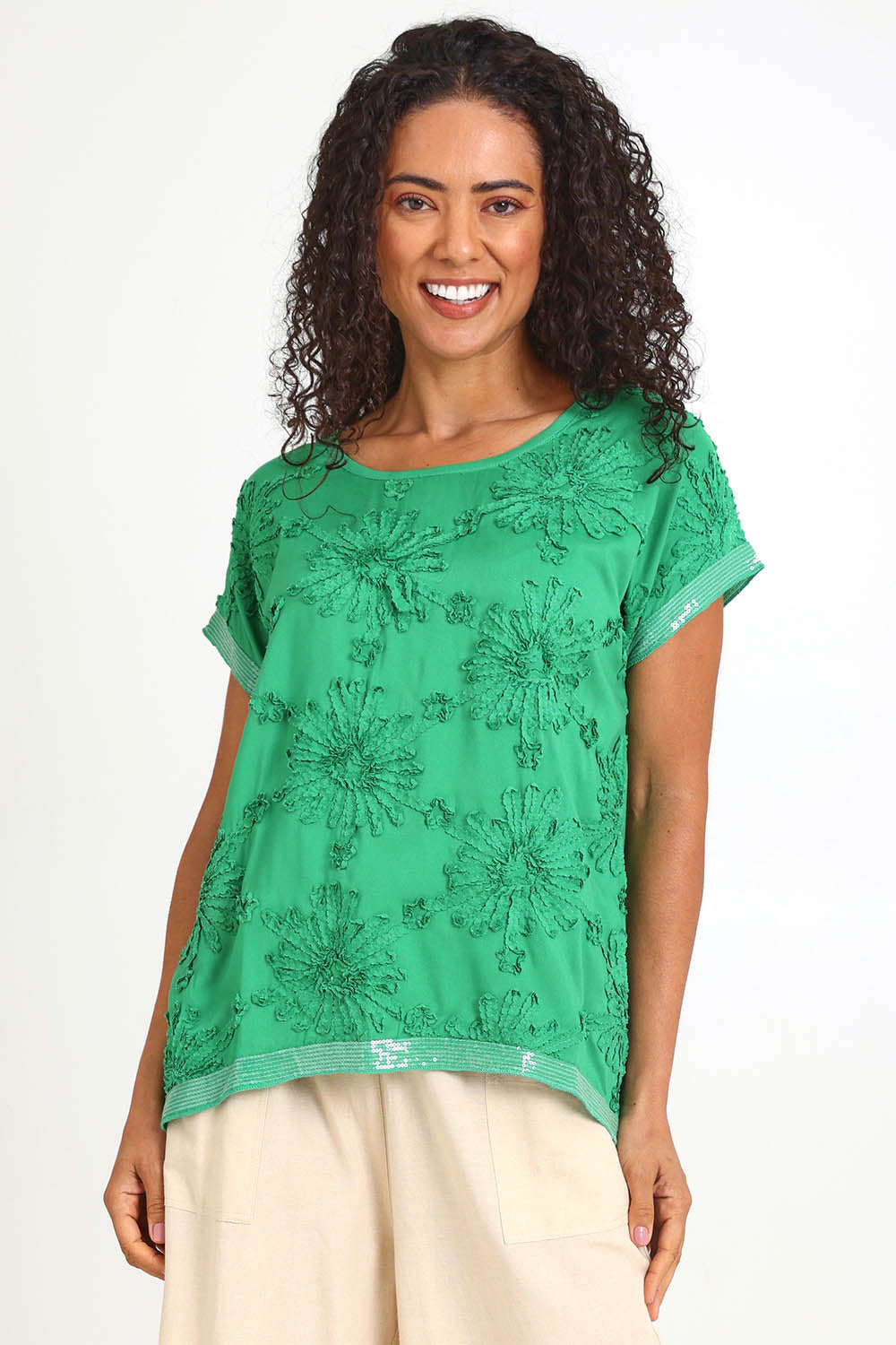 Model Pamelar wearing size 10 of the Embellished Tee – Green in colour Green, in a cropped view