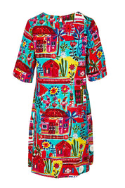 Product shot of the Contemporary Elbow Sleeve Dress in colour Folkhuts (Blue), from the back