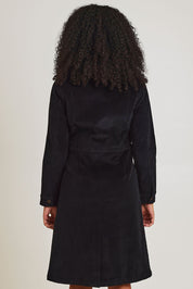 Model Ziara wearing size 10 of the Cotton Corduroy Button Dress in colour Black (Black), from the back