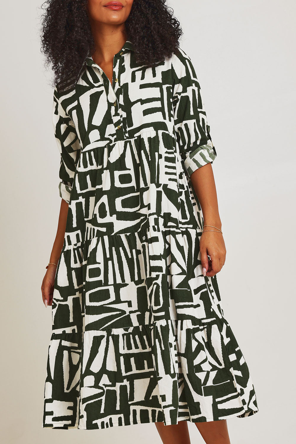 Model Ziara wearing size 10 of the Corduroy Cotton Collar Dress in colour Olive (Green), from the front, cropped image