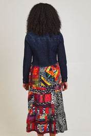 Model Ziara wearing size 10 of the Denim Mix Dress in colour Runaway, from the back
