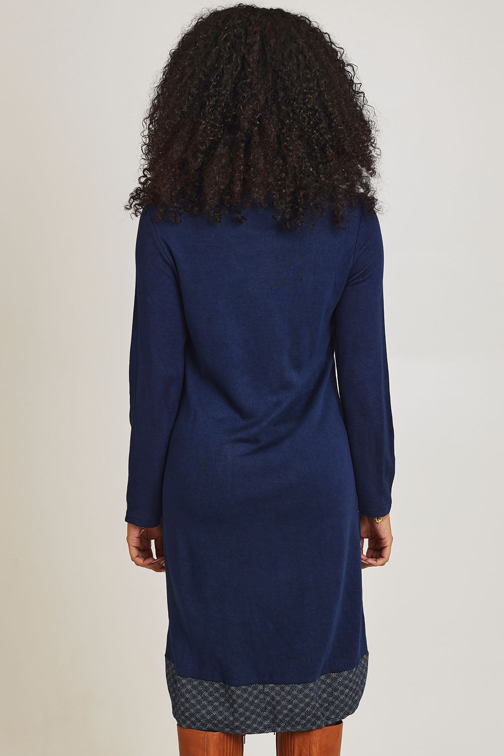 Model Ziara wearing size 10 of the Dancing Queen Cotton Patch Dress in colour Dancing (Blue), from the back