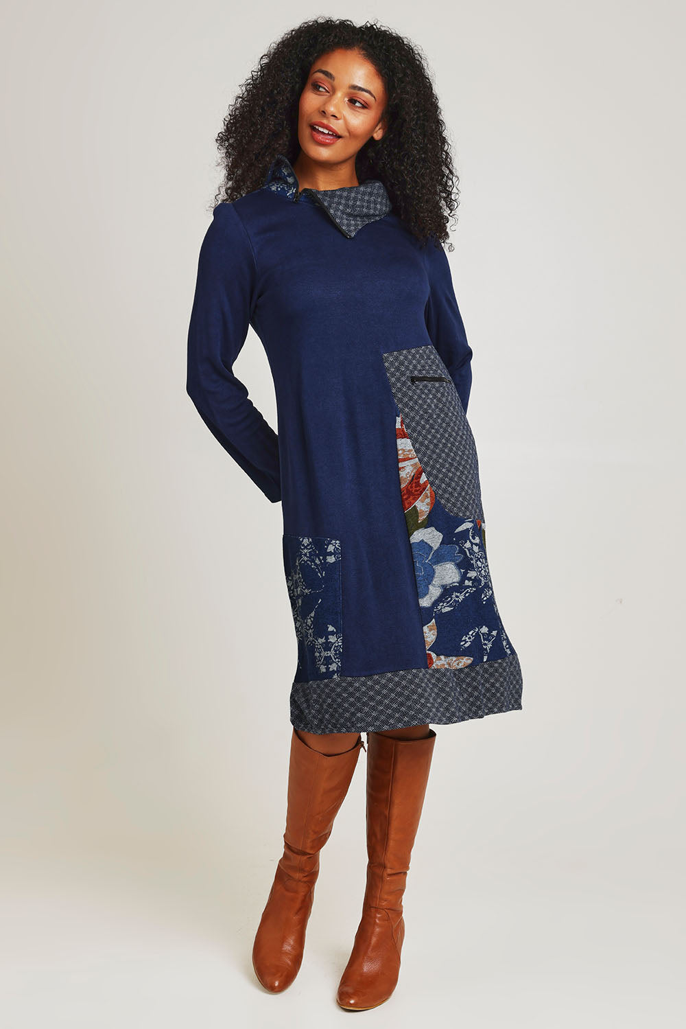 Model Ziara wearing size 10 of the Dancing Queen Cotton Patch Dress in colour Dancing (Blue), from the front, showing the whole outfit