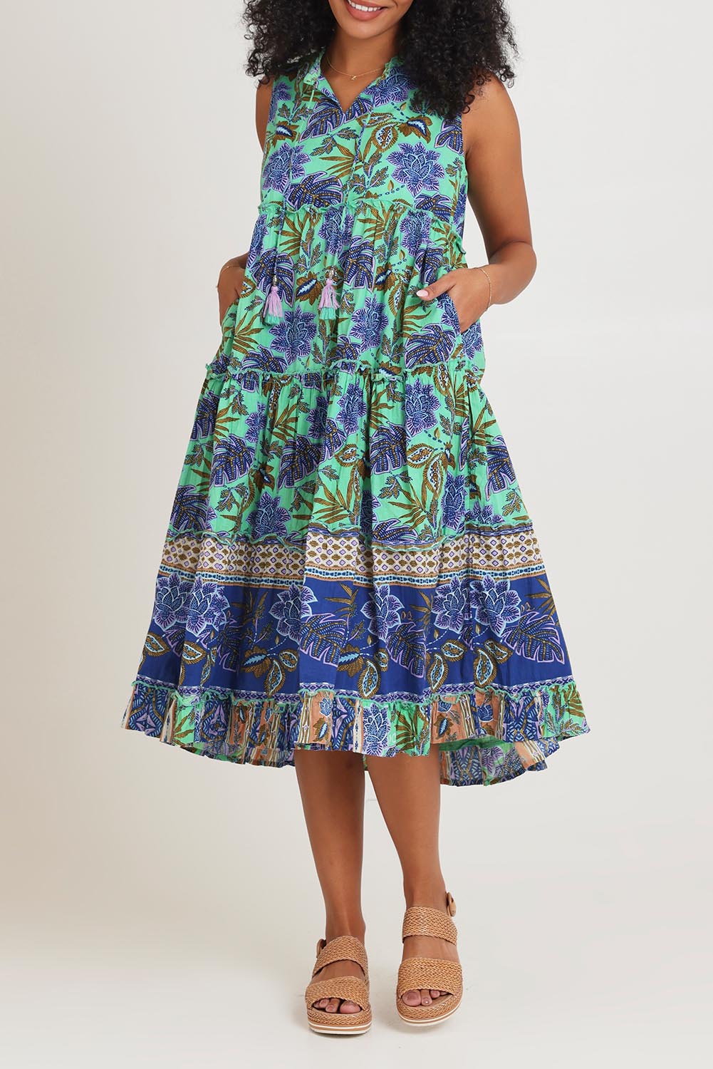 Model Ziara wearing size 10 of the Sleeveless Layers Cotton Dress in colour Lascuevas, from the front, cropped image