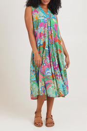 Model Ziara wearing size 10 of the Sleeveless V Cotton Dress in colour Santacruz, from the front, cropped image
