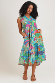 Model Ziara wearing size 10 of the Sleeveless V Cotton Dress in colour Santacruz, from the front, showing the whole outfit