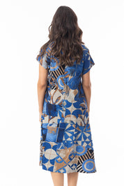 A model wearing the Wyndham Shift Flair Cotton Dress in colour Print, from the back