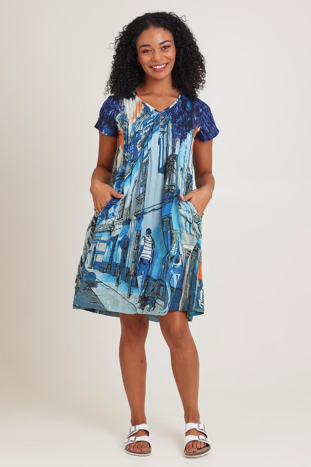 Model Ziara wearing size 10 of the Ezy Fit Cotton Dress in colour Towerblue, from the front, showing the whole outfit