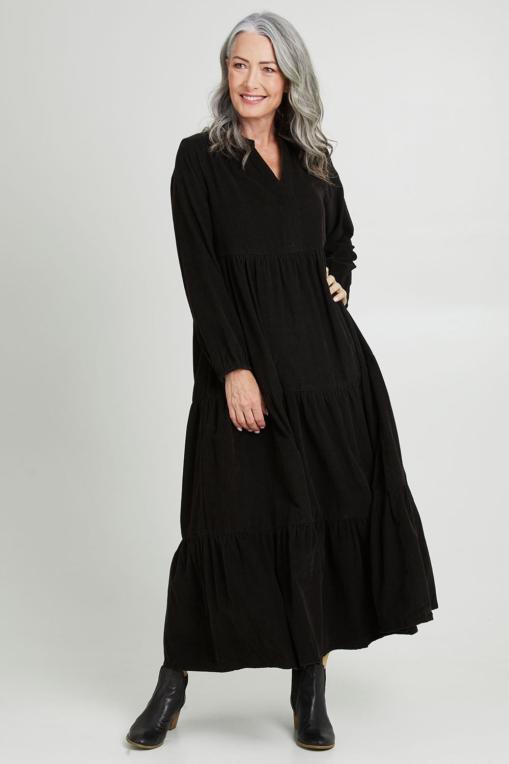 Model Luisa wearing size 10 of the Essentials Cord Layered Maxi Dress in colour Black (Black), from the front, showing the whole outfit