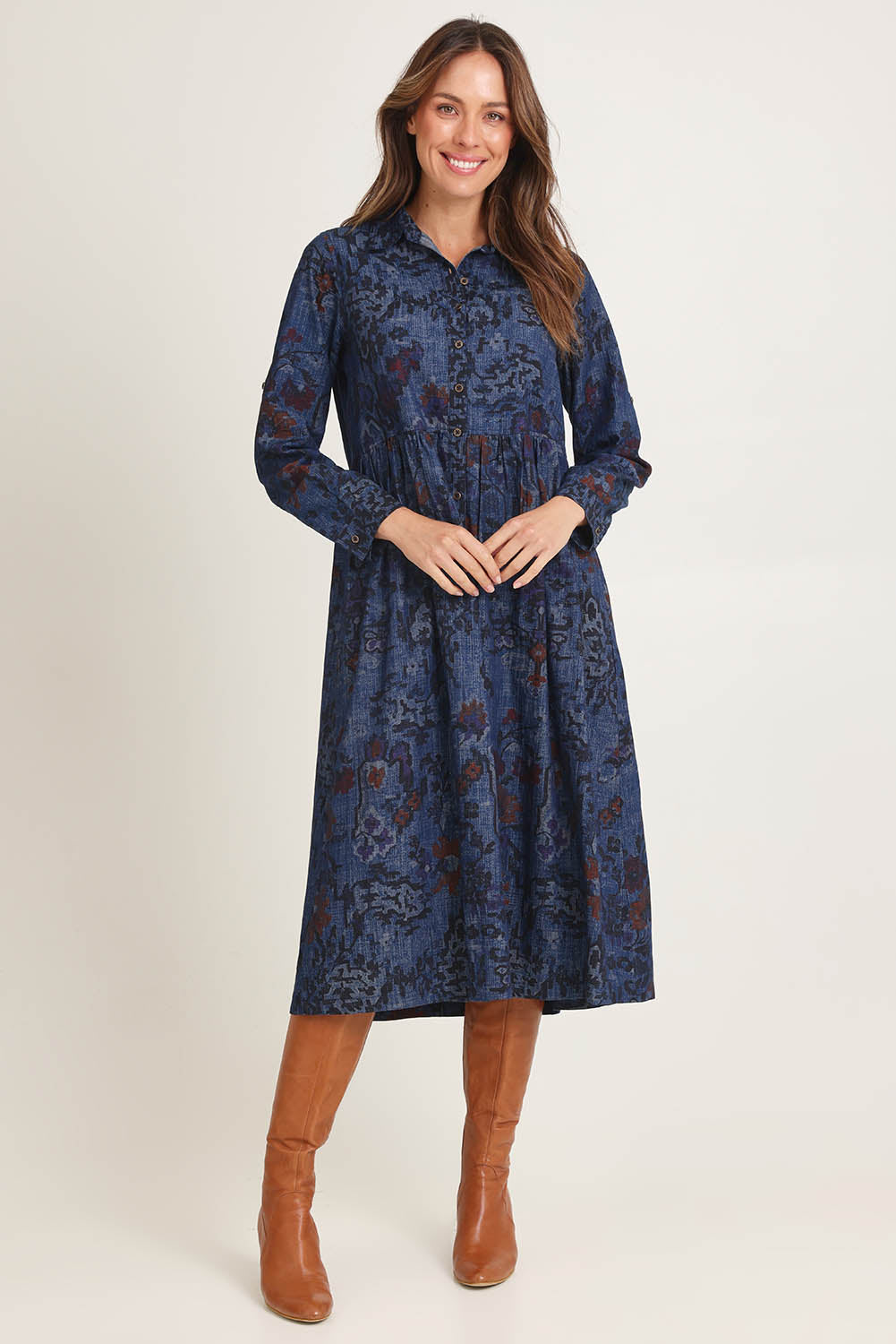 Model Madeline wearing size 10 of the Midi Collar Dress in colour Tabriz (Blue), from the front, showing the whole outfit