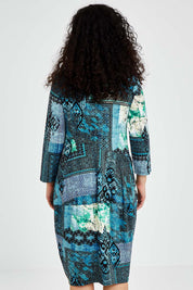 A model wearing size 10 of the Isfahani Dress Bubble in colour Blue (Blue), from the back