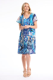 Model Genericm wearing size sample of the Easy Fit Dress – Print in colour Print, from the front