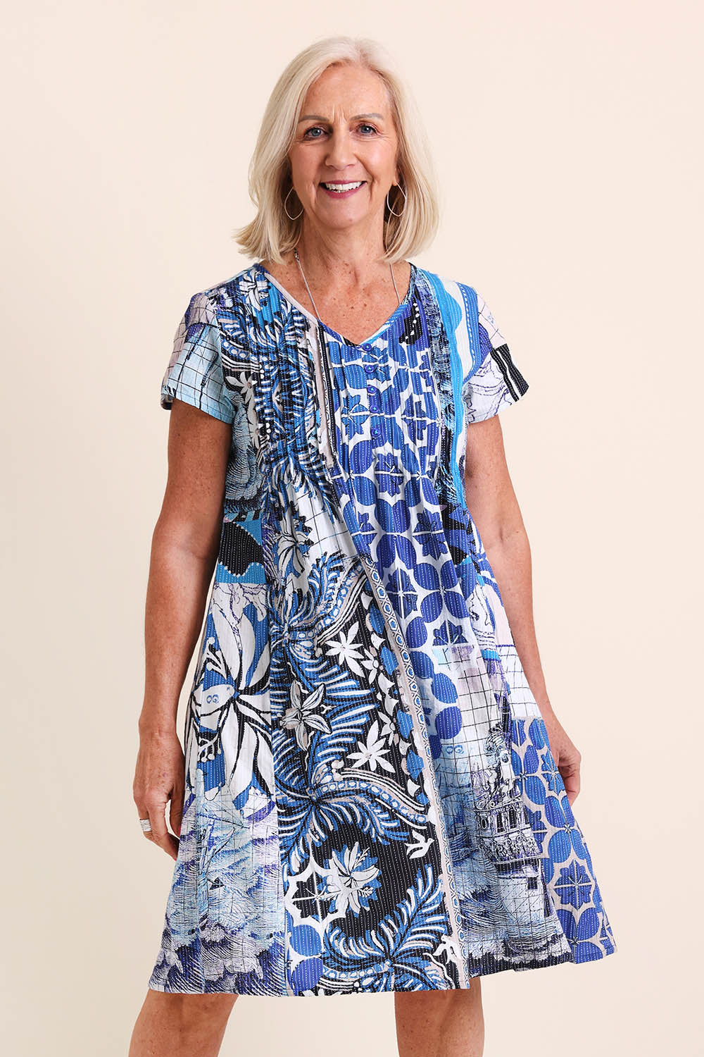 Model Sandys wearing size 10 of the Easy Fit Cotton Dress – Print in colour Print, in a cropped view