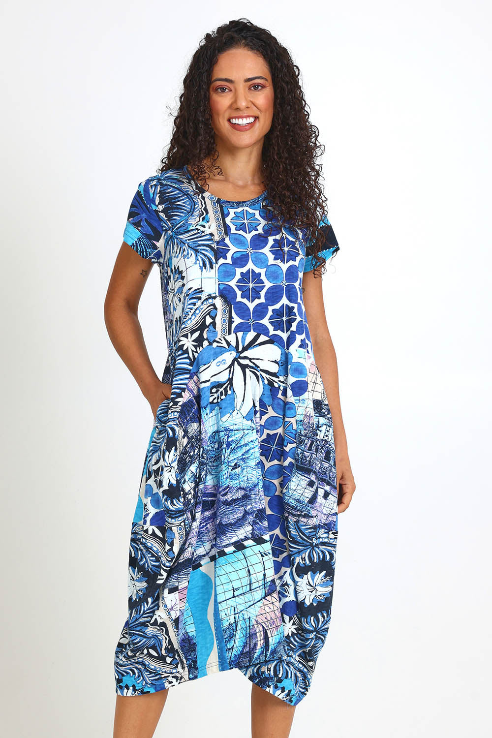 Model Pamelar wearing size 10 of the Horseshoe Bubble Dress – Print in colour Print, from the front