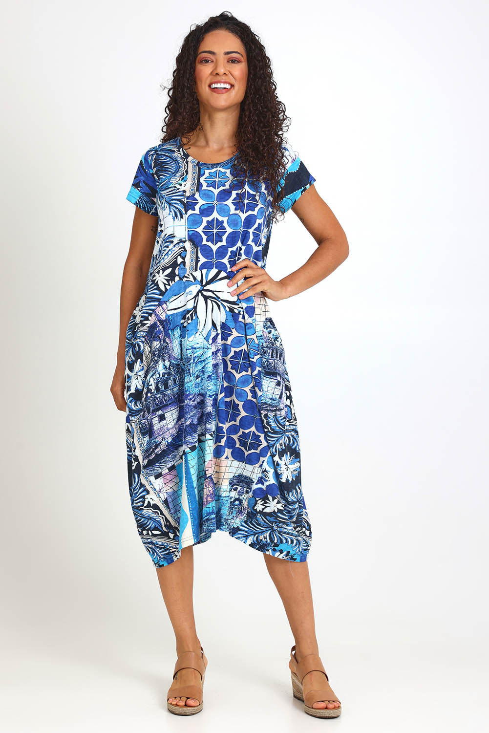 Model Pamelar wearing size 10 of the Horseshoe Bubble Dress – Print in colour Print, from the front
