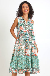 Model Pamelar wearing size 10 of the Sleeveless Layers Dress – Print in colour Print, in a cropped view