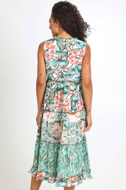 Model Pamelar wearing size 10 of the Sleeveless Layers Dress – Print in colour Print, from the front