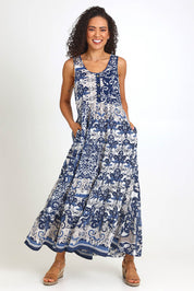 Model Pamelar wearing size 10 of the Sleeveless Knit Top Dress – Print in colour Print, from the front