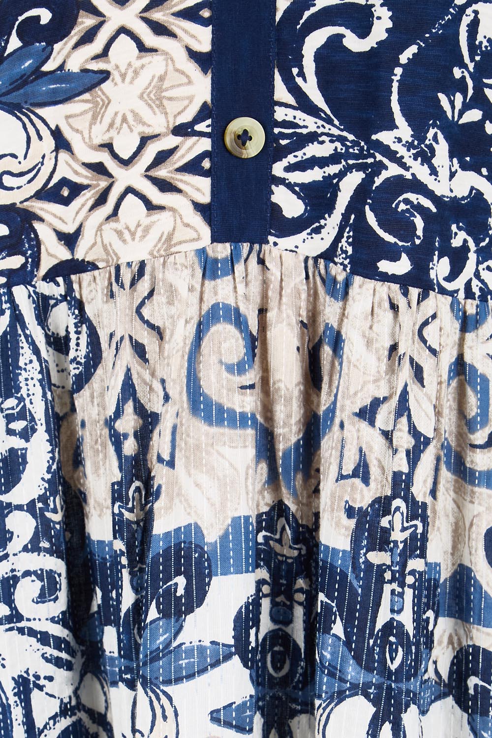 Product shot of the Sleeveless Knit Top Dress – Print in colour Print, showing detail