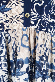 Product shot of the Sleeveless Knit Top Dress – Print in colour Print, showing detail