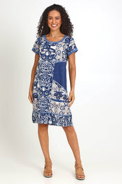 Model Pamelar wearing size 10 of the Patch Dress – Print in colour Print, from the front
