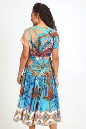 Model Pamelar wearing size 10 of the V-Neck Button Through Dress – Print in colour Print, from the back