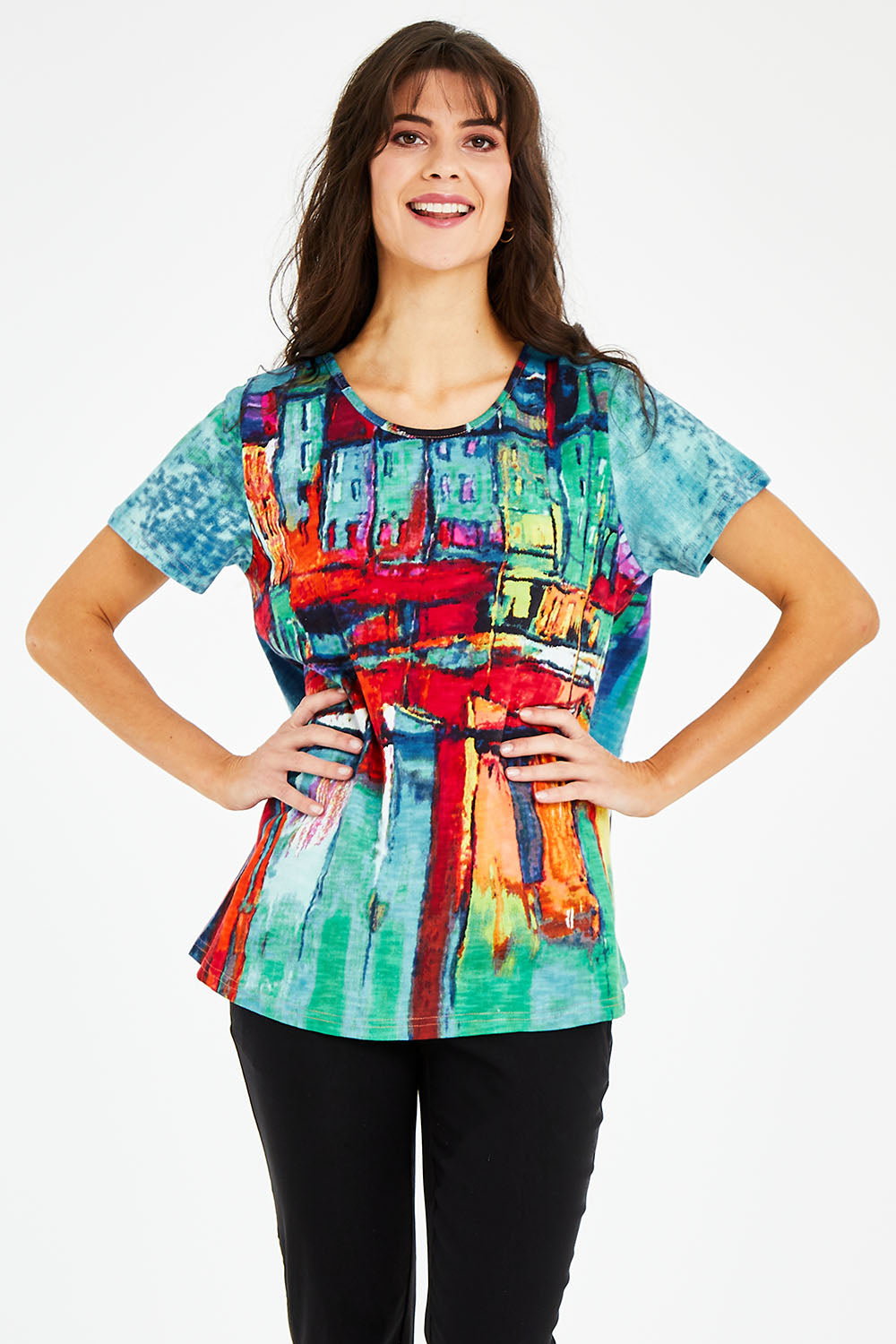 Model Courtney wearing size 10 of the Boats Organic Cotton Tee in colour Boats (Blue), from the front, cropped image