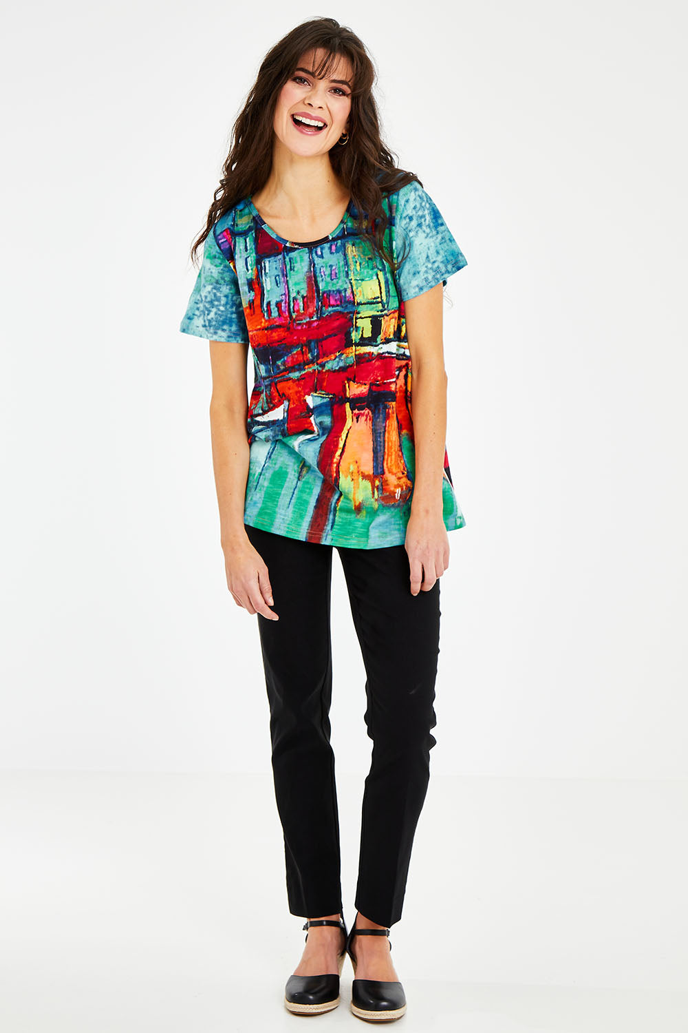 Model Courtney wearing size 10 of the Boats Organic Cotton Tee in colour Boats (Blue), from the front, showing the whole outfit