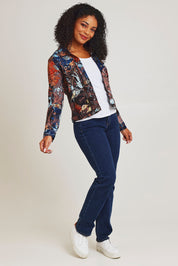 Model Ziara wearing size 10 of the Organic Cotton Biker Jacket in colour Abstract, from the front, showing the whole outfit