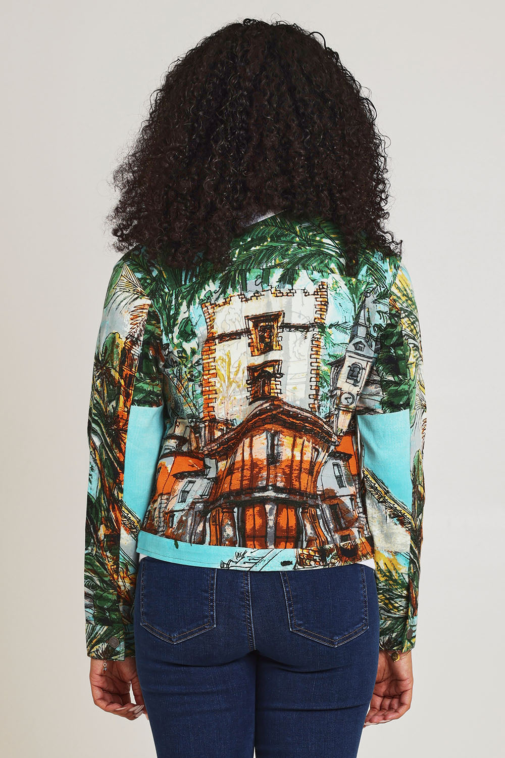 Model Ziara wearing size 10 of the Biker Jacket in colour Alicante (Green), from the back