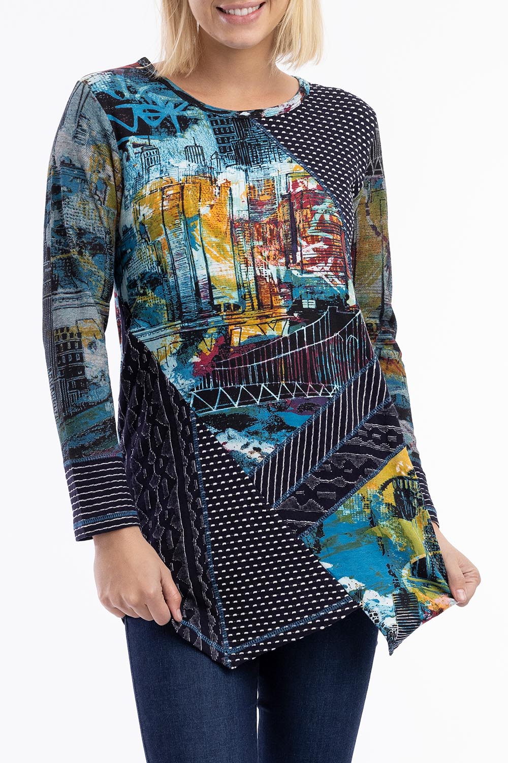 A model wearing the New York Patch Tunic Top in colour Newyork (Blue), from the front, cropped image