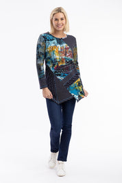 A model wearing the New York Patch Tunic Top in colour Newyork (Blue), from the front, showing the whole outfit