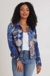 Model Ziara wearing size 10 of the Wyndham Cotton Jacket in colour Wyndham (Blue), from the front, cropped image
