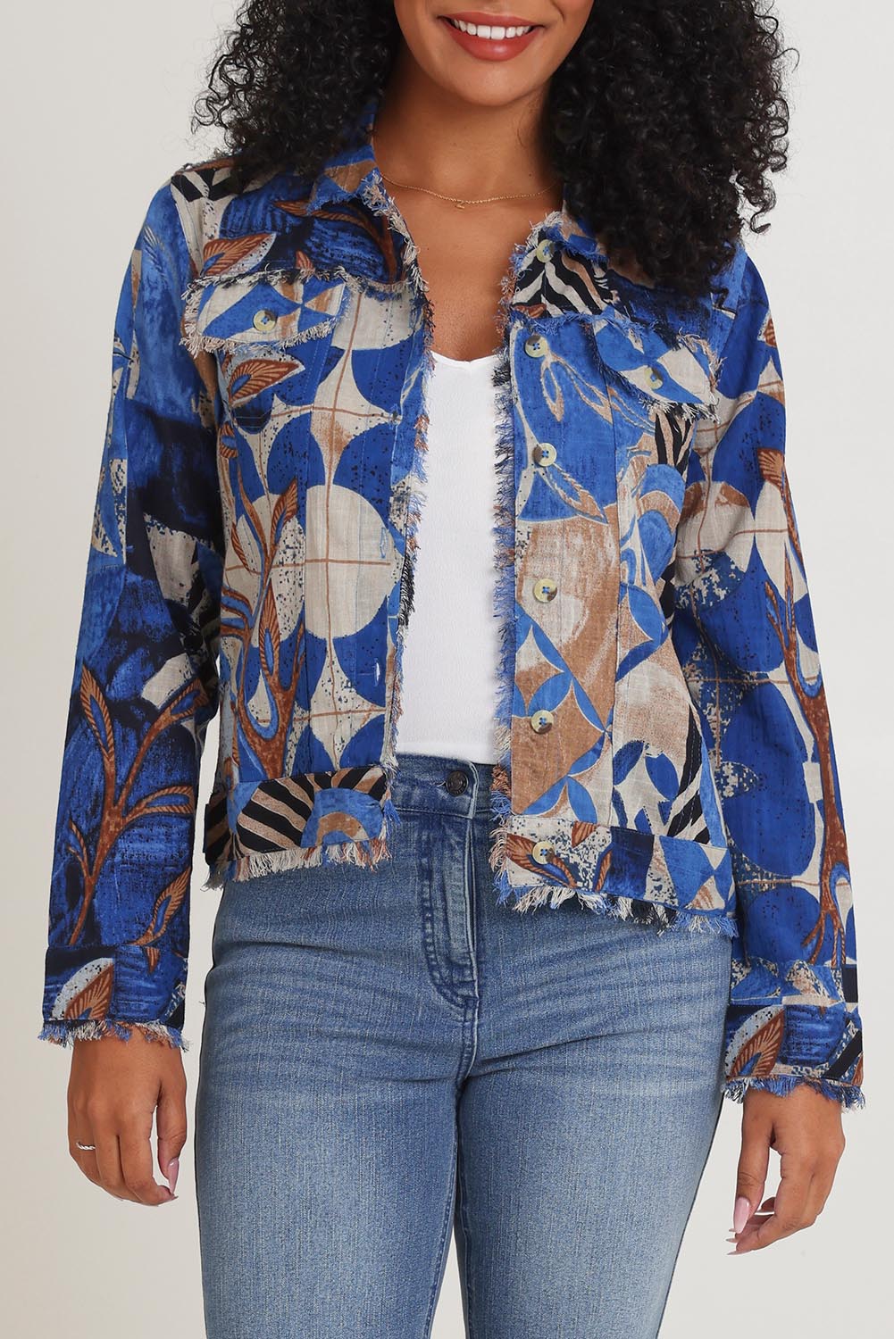 Model Ziara wearing size 10 of the Wyndham Cotton Jacket in colour Wyndham (Blue), from the front, cropped image