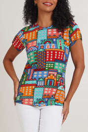 Model Ziara wearing size 10 of the Cotton Blend Crew Tin colourShirt - City, from the front, cropped image