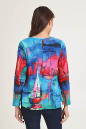 Model Madeline wearing size 10 of the Contemporary V Tee in colour Sailboats (Blue), from the back